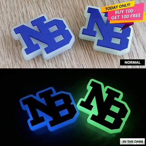 Embrace the Night with Glow-in-the-Dark Logo Clog Charms